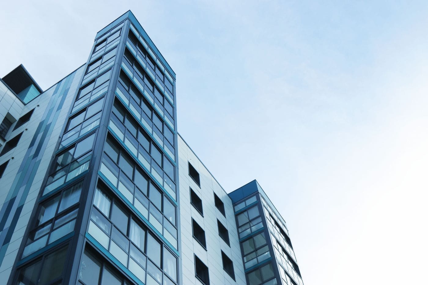 Modern commercial building exterior at dusk